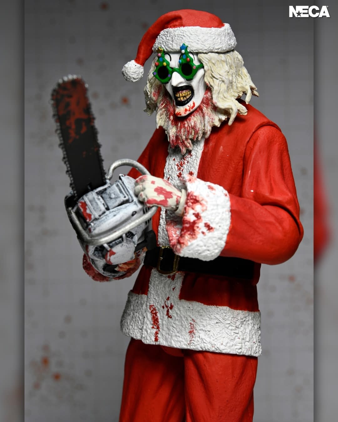 NECA Unveils Terrifier 3 Ultimate Bloody Santa Suit Art the Clown