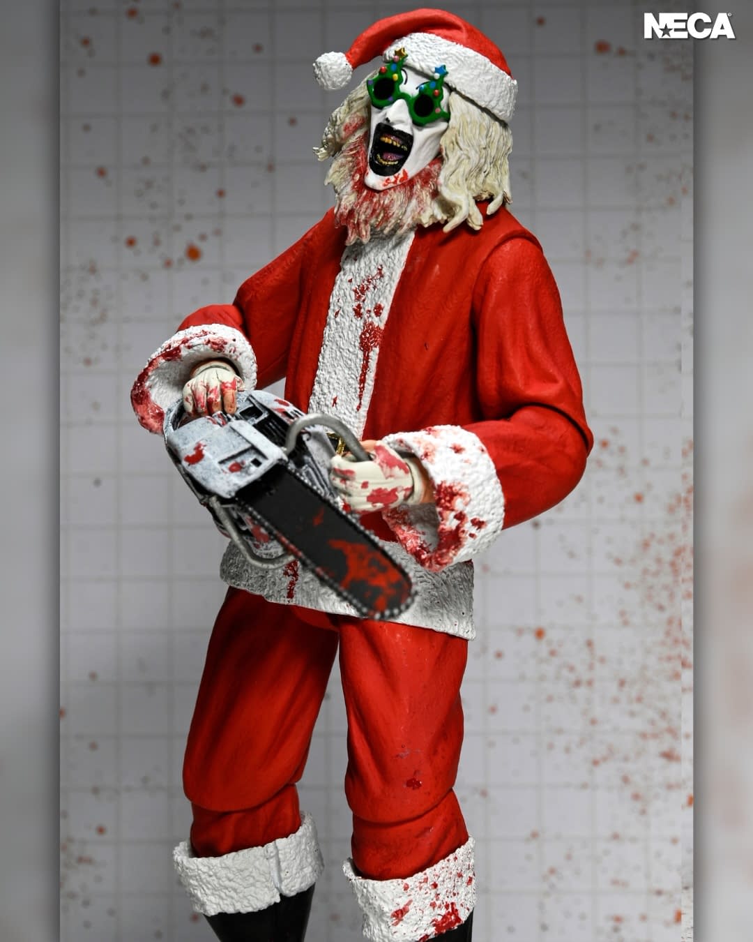 NECA Unveils Terrifier 3 Ultimate Bloody Santa Suit Art the Clown