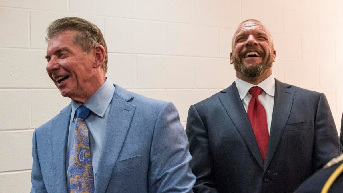 WWE CEO Vince McMahon and Paul "Triple H" Levesque speak to Army Command Sgt. Maj. John W. Troxell, Senior Enlisted Advisor to the Chairman of the Joint Chiefs of Staff, before the 14th Annual Tribute to the Troops Event at the Verizon Center in Washington, D.C., Dec. 13, 2016. WWE Tribute to the Troops is an annual event held by WWE and Armed Forces Entertainment in December during the holiday season since 2003, to honor and entertain United States Armed Forces members. WWE performers and employees travel to military camps, bases and hospitals, including the Walter Reed Army Medical Center and Bethesda Naval Hospital. DoD Photo by Navy Petty Officer 2nd Class Dominique A. Pineiro