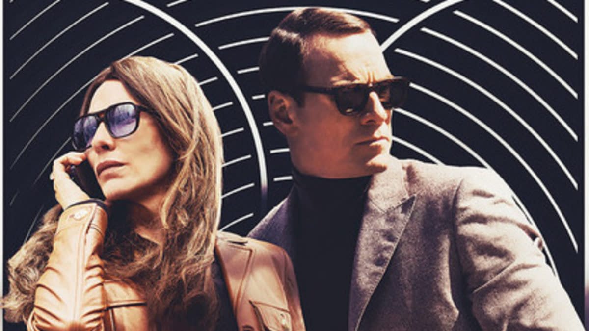 A woman with long brown hair wearing sunglasses and a leather jacket is on the phone, standing next to a man in a grey suit and sunglasses, both against a swirling black and white background. The post discusses "Black Bag," a slick and stylish thriller from director Steven Soderbergh.