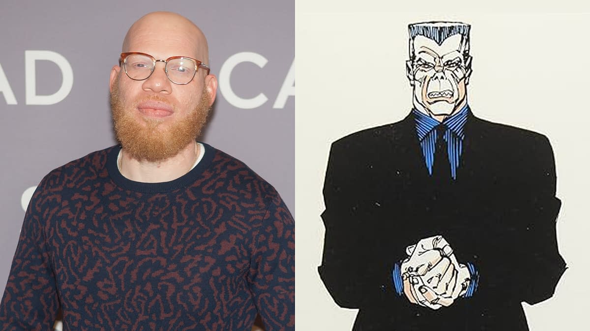 Marvin Jones III, wearing glasses and a patterned sweater, poses for the camera against a gray background at the SCAD aTV Fest 2018. Next to him is an illustration of the character Tombstone, depicted as a large, muscular man in a black suit with an aggressive expression.