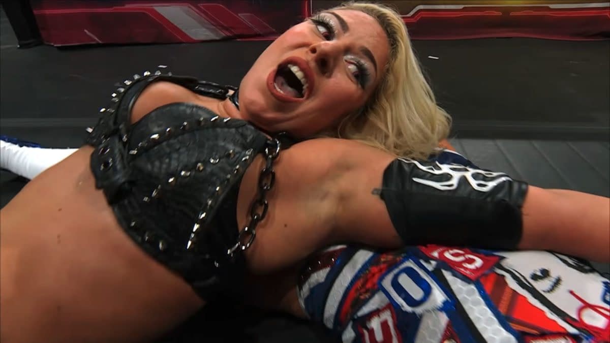 AEW Women's World Champion Thekla performs a wrestling move on Alex Windsor during a match at AEW Collision Spring Breakthru, showcasing her strength and determination.