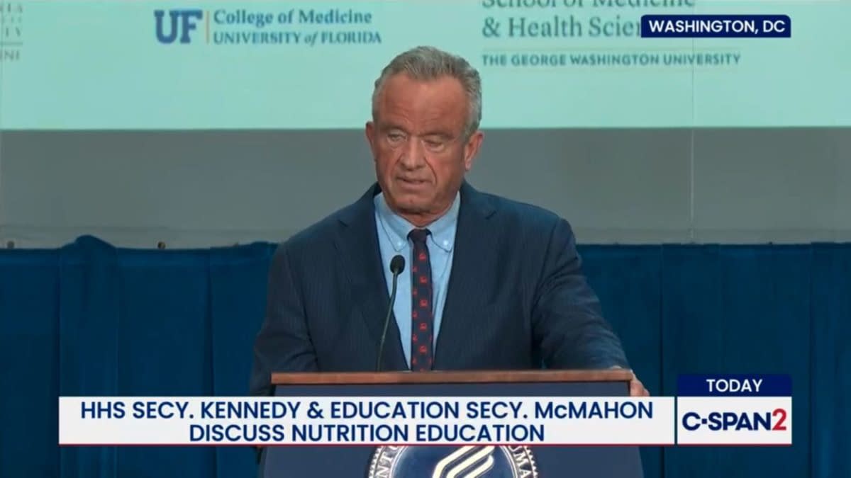 Robert F. Kennedy Jr. stands at a podium during a Washington, DC press conference about nutrition education, with C-SPAN2 graphics on screen.