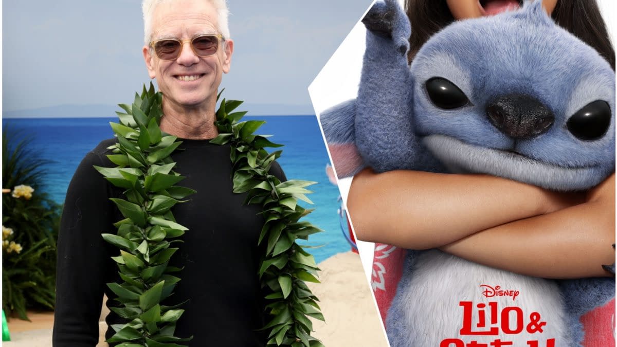 Chris Sanders smiles in a lei beside a Lilo & Stitch promotional image featuring Stitch hugging Lilo.