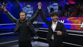 Jack Perry celebrates with Tony Khan on AEW Dynamite before attacking him.