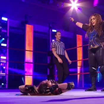 Nia Jax stands triumphant over Kairi Sane on WWE Monday Night Raw. [Broadcast/WWE]