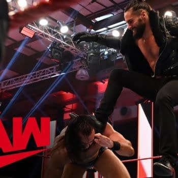 Seth Rollins viciously Stomps Drew McIntyre on Raw, courtesy of WWE.