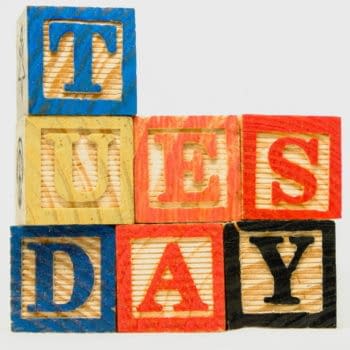 tuesday-text-on-wooden-blocks-on-white-background