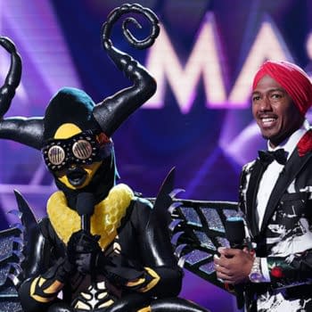 THE MASKED SINGER: L-R: Bee and host Nick Cannon in the “Semi Finals: Double Unmasking” episode of THE MASKED SINGER airing Wednesday, Feb. 20 (9:00-10:00 PM ET/PT) on FOX. © 2019 FOX Broadcasting. Cr. Michael Becker / FOX.