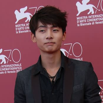Haruma Miura poses at the photocall for 'Harlock: Space Pirate' during the 70th Venice Film Festival, in front of a pink backdrop featuring festival logos.