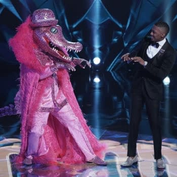 THE MASKED SINGER: L-R: Crocodile and host Nick Cannon in the "Six More Masks" episode of THE MASKED SINGER airing Wednesday, Sept. 30 (8:00-9:00 PM ET/PT) on FOX. © 2020 FOX MEDIA LLC. CR: Michael Becker/FOX.