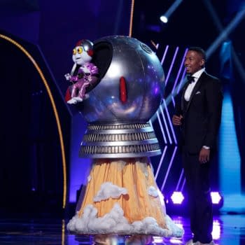 THE MASKED SINGER: L-R: Baby Alien and host Nick Cannon in the “The Group B Play Offs - Cloudy with a Chance of Clues” episode of THE MASKED SINGER airing Wednesday, Oct. 14 (8:00-9:00 PM ET/PT) on FOX. © 2020 FOX MEDIA LLC. CR: Michael Becker/FOX.