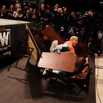 Cody Rhodes crashes through a table with Shaq on AEW Dynamite - Credit: All Elite Wrestling