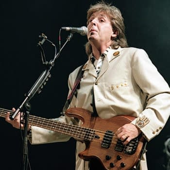 Washington DC. USA, 4th July, 1990 Paul McCartney performs at the Fourth of July concert in the Robert F. Kennedy football stadium. (Image: mark reinstein/Shutterstock.com)