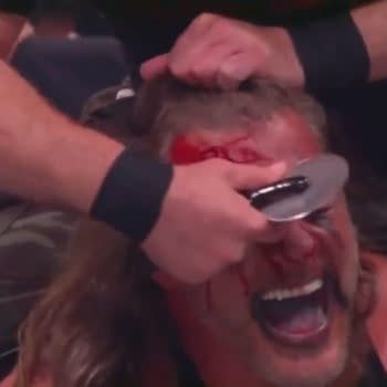 Nick Gage slices up the forehead of Chris Jericho right before AEW Dynamite cuts to a commercial for Domino's Pizza.