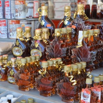 Ottawa, Canada - August, 2017 - A stall at the Byward Market displays maple syrup products all with generic 100% Pure Maple Syrup labels. (Vintagepix/Shutterstock.com)
