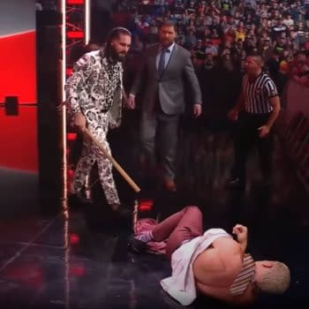 Seth Rollins assaults Cody Rhodes on WWE Raw