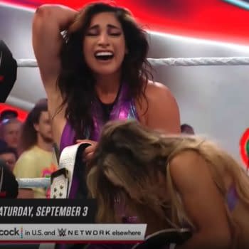Rachel Rodriguez and Aliyah celebrate winning the tag team championships on WWE Raw