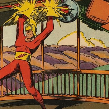 Speed Comics #6 (Brookwood, 1940). A comic book illustration of a muscular superhero in a red outfit lifting a car overhead, surrounded by colorful clouds and a dramatic sky. The action is energy-filled, with visual effects suggesting strength and power.