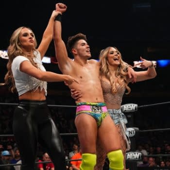 Sammy Guevara celebrates defeating Darby Allin on AEW Rampage with Anna Jay and Tay Melo