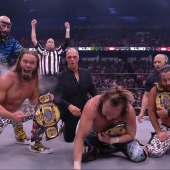 The Elite celebrate becoming inaugural AEW World Trios Champions at All Out