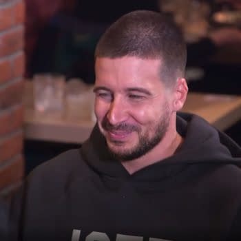 Vinny grins like a fool whenever Angelina is around, betraying his uncaring facade on Jersey Shore: Family Vacation [screencap]