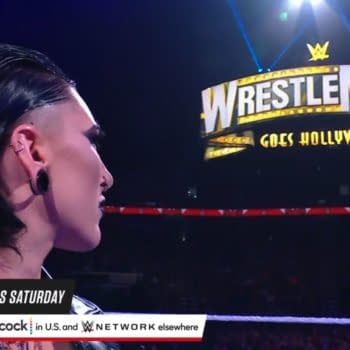 Royal Rumble winner Rhea Ripley gazes at the WrestleMania sign after challenging Charlotte Flair on WWE Raw