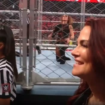 Lita helps Becky Lynch defeat Bayley in a steel cage on WWE Raw