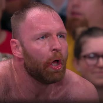 Jon Moxley reacts to The Elite returning on AEW Dynamite and trying to stab him with a screwdriver.