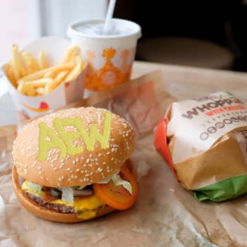 An artist's recreation of Tony Khan's alleged condiment caper, based on Image: Bangkok, Thailand - July 9, 2018 : Close up of a Burger King Whopper with cheese burgers, fries and soft drink served at a store at Sala Daeng (Shutterstock.com/Terence Toh Chin Eng)