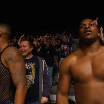 Private Party celebrates winning the AEW World Tag Team Championship in the crowd on AEW Dynamite