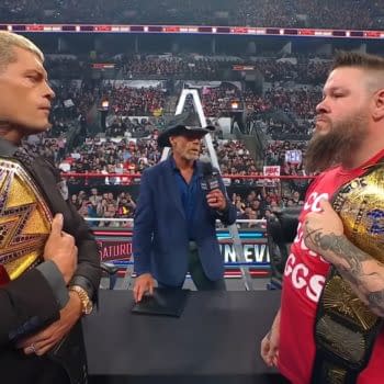 Shawn Michaels moderates a contract signing between Cody Rhodes and Kevin Owens on WWE Saturday Night's Main Event