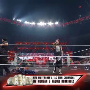 Liv Morgan and Raquel Rodriguez celebrate winning the tag titles on WWE Raw