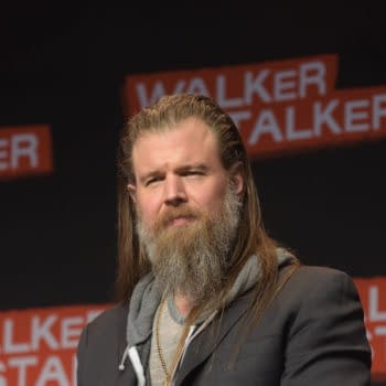 A man with long hair and a beard appears in front of a dark background featuring the words "WALKER STALKER" in red text. Ryan Hurst joins the impressive cast of 'The Odyssey,' heightening excitement for the upcoming project.