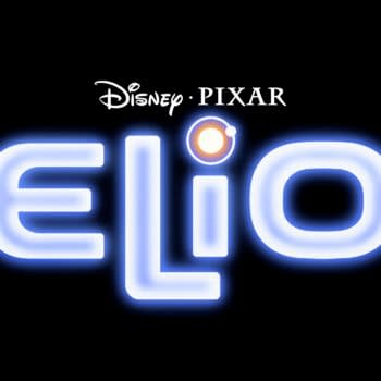 The logo for 'Elio,' a Disney Pixar production, features the title in glowing blue letters with an orange circle placed above the 'i,' set against a black background.