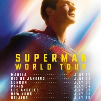 A promotional poster for the Superman World Tour featuring a smiling man in a Superman costume, looking upwards with a vibrant light background. The poster lists tour dates and locations including Manila, Rio de Janeiro, London, Paris, Los Angeles, New York, and Beijing.