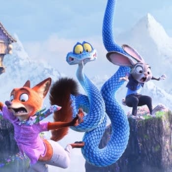 A cartoon illustration from "Zootopia 2" featuring the characters Nick Wilde, a fox wearing a floral shirt, Judy Hopps, a rabbit, and Gary De’Snake, a snake, all appearing startled and leaping in a vibrant, mountainous landscape filled with greenery and flowers. This animated scene captures the adventurous spirit of Disney's upcoming release.