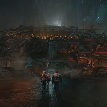 A cinematic scene from 'The Fantastic Four: First Steps,' featuring four characters, including a fiery man and a blue-skinned figure, walking towards a massive, futuristic structure illuminated by eerie lighting, with a misty atmosphere.