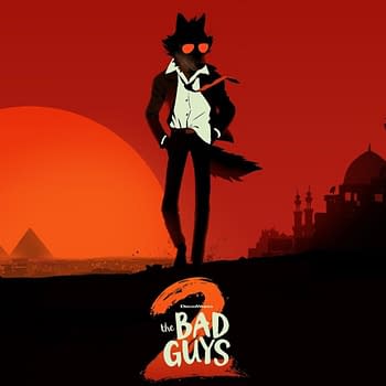 A stylized illustration from 'The Bad Guys 2,' featuring a cool wolf-like character wearing sunglasses and a suit, standing confidently against a striking red sunset with silhouette representations of pyramids and palm trees in the background.