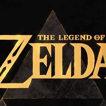 Logo for 'The Legend of Zelda' featuring bold, golden letters against a dark background, with a triangular symbol integrated into the design.