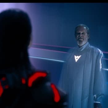 Illustration from Disney's 'TRON: ARES,' featuring Jared Leto as Ares facing Jeff Bridges as Flynn, with a futuristic background showcasing glowing lines and a digital aesthetic.