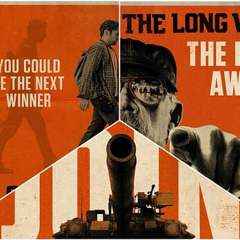 A promotional poster for 'The Long Walk' featuring three characters walking against an orange background, with bold text proclaiming "YOU COULD BE THE NEXT WINNER" and "THE ROAD AWAITS YOU," along with imagery of a cannon and an elderly man with glasses pointing. The design conveys themes of competition and anticipation.