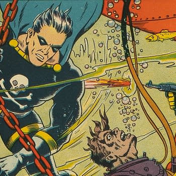 Exciting Comics #28 (Nedor, 1943).An illustration from Exciting Comics #28 shows a superhero in a black outfit with a skull emblem, wielding a chain underwater. He faces an antagonist who is underwater, screaming, while another character holds a weapon and bubbles surround them.