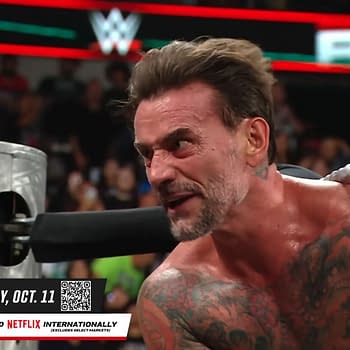 A visibly upset wrestler, with tattoos covering his torso, is yelling while gripping the ropes in a wrestling ring on WWE Raw. The audience can be seen in the background, along with promotional graphics for an upcoming event.