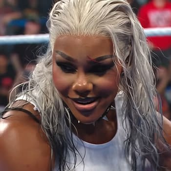 Jade Cargill, in a sleeveless top and sporting long, silver hair, displays a confident expression in a wrestling ring during WWE SmackDown. The crowd is visible in the background, indicating an energetic atmosphere.