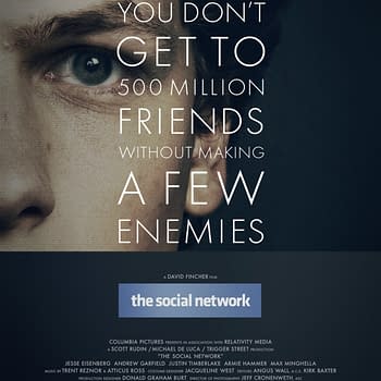 A promotional poster for the film 'The Social Network' featuring a close-up of a man's face with intense eyes, overlaid with the quote "You don’t get to 500 million friends without making a few enemies" and credits at the bottom.