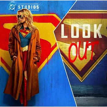 A colorful illustration featuring a character resembling Supergirl, wearing her iconic costume and a brown coat, standing beside a graffiti-style superman logo with the words 'LOOK OUT' written on it. The background is vibrant with blue and red tones, emphasizing themes of heroism and justice.