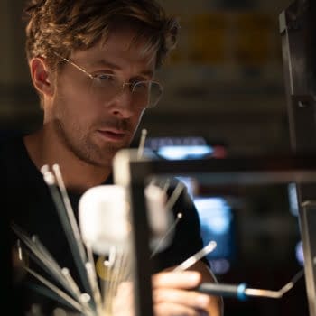 Project Hail Mary Ryan Gosling portrays Ryland Grace in a scene from 'Project Hail Mary,' focusing intently on scientific equipment amid a dimly lit environment.