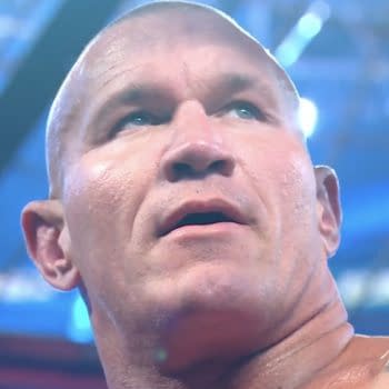 A close-up of Randy Orton celebrating after winning the Elimination Chamber match, with visible excitement on his face, as he anticipates the chance to become a 15-time world champion.