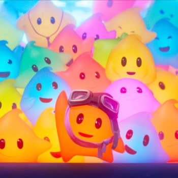A vibrant illustration featuring a group of cheerful, colorful ghost-like characters, predominantly in shades of pink, blue, green, and yellow, with one character in the foreground wearing goggles and a scarf. The scene is filled with a joyful atmosphere enhanced by the glowing colors.